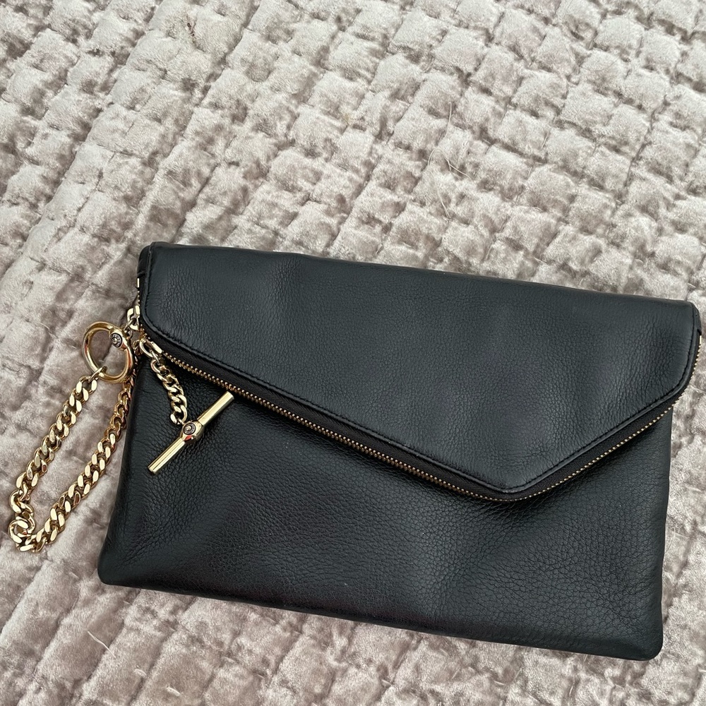 Black, henri bendel clutch with gold chain accents